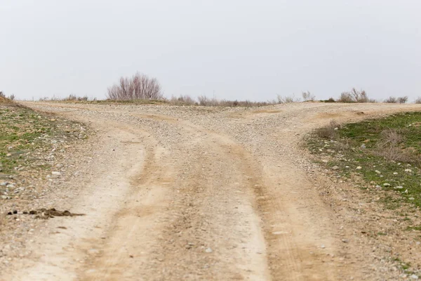 Camino de la pista en el desierto — Foto de Stock