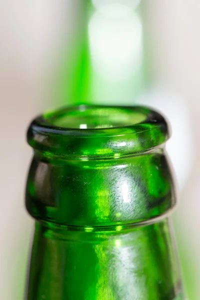 Green glass bottle neck. close — Stock Photo, Image