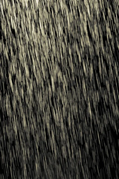 Pioggia gialla su fondo nero — Foto Stock