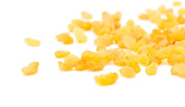 beyaz zemin üzerine altın kuru üzüm