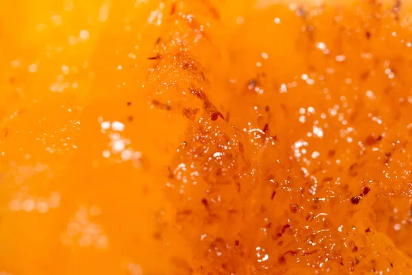 Dužina zralé persimmony jako pozadí. makro — Stock fotografie