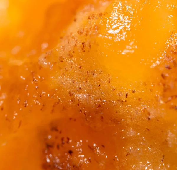 Pulp ripe persimmons as a background. macro — Stock Photo, Image