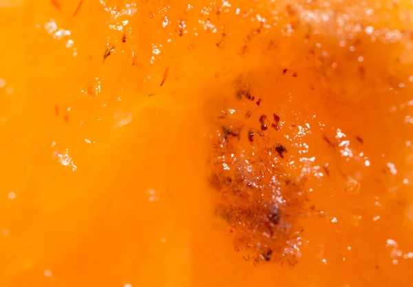 Pulp ripe persimmons as a background. macro — Stock Photo, Image