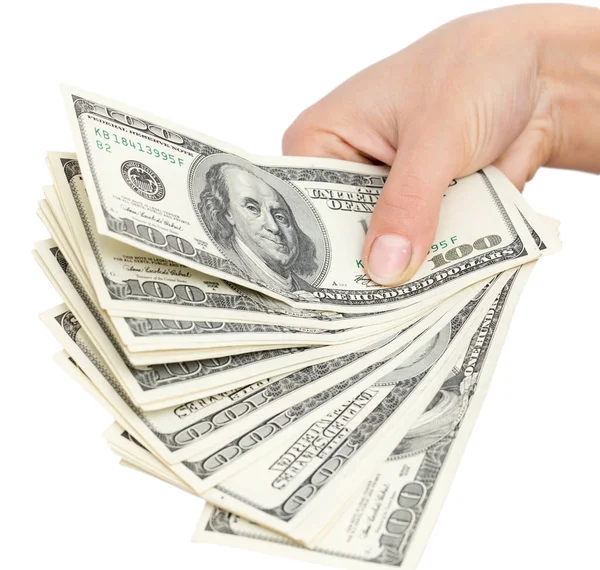 Доллары в руке на белом фоне — стоковое фото