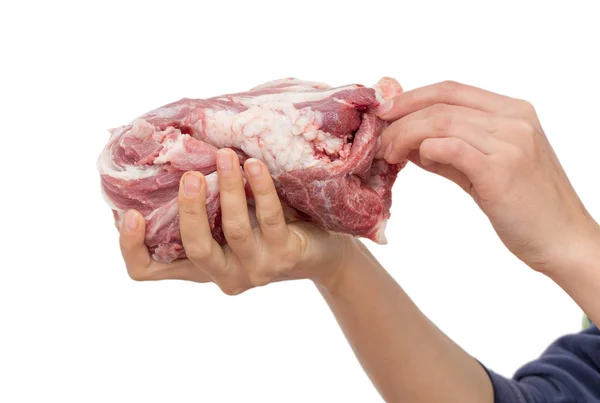 Carne fresca en la mano sobre un fondo blanco — Foto de Stock