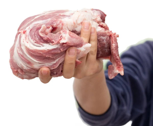 Čerstvé maso v ruce na bílém pozadí — Stock fotografie