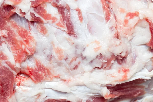 Čerstvé vepřové maso jako pozadí — Stock fotografie