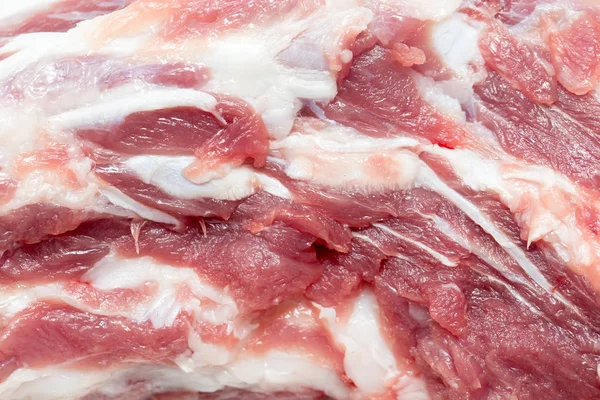 Carne de porco fresca como fundo — Fotografia de Stock