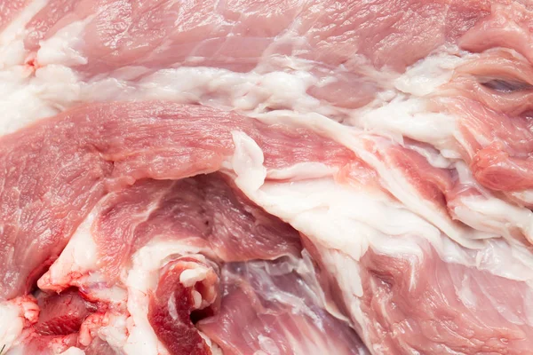 Frisches Schweinefleisch als Hintergrund — Stockfoto