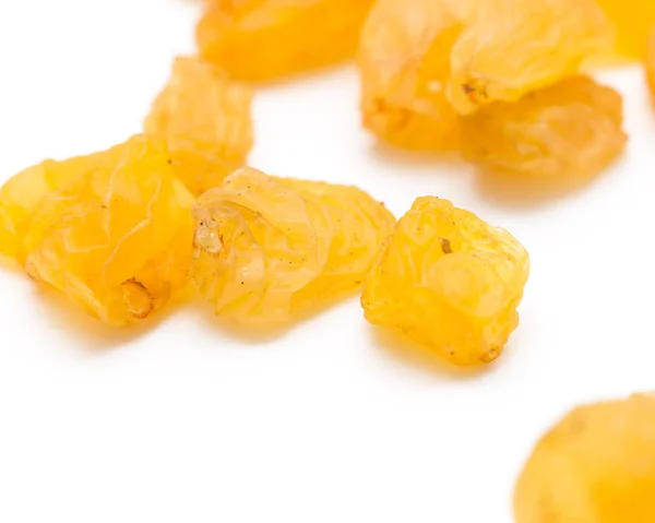 Golden raisins on a white background — Stock Photo, Image