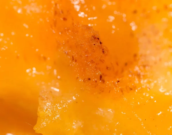 Pulp rijpe persimmons als achtergrond. Macro — Stockfoto