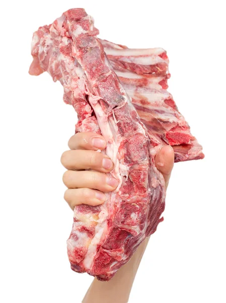 Carne fresca en la mano sobre un fondo blanco —  Fotos de Stock