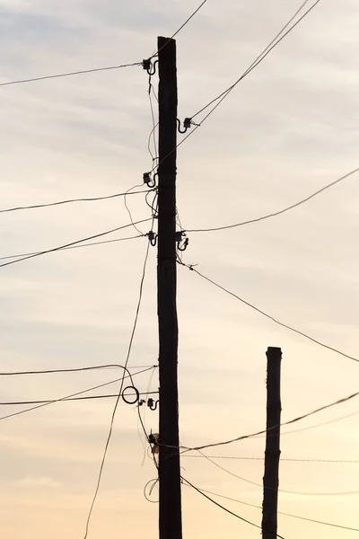 Elektrisk påle ved soloppgang – stockfoto