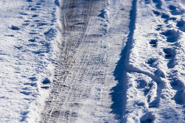 Neve e ghiaccio sulla strada — Foto Stock