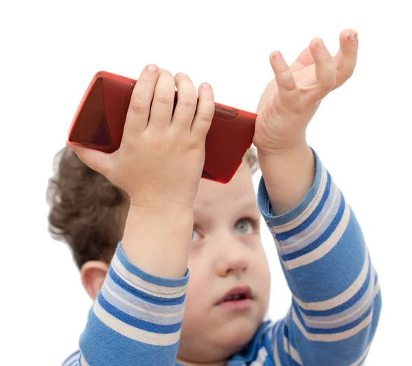 白い背景の上の携帯電話を持つ少年 — ストック写真