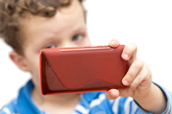 Chlapec s telefonem na bílém pozadí — Stock fotografie