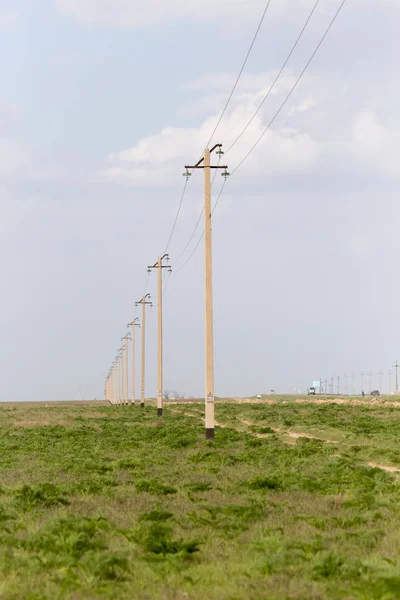 Power poles in the desert — Stock Photo, Image