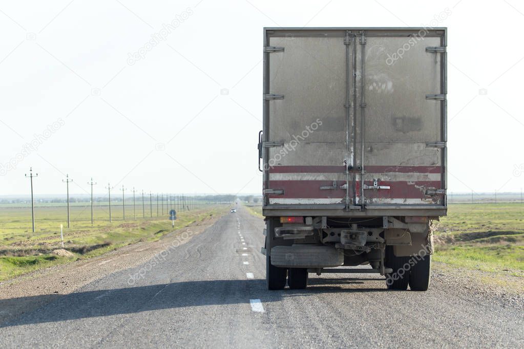 truck in motion on road