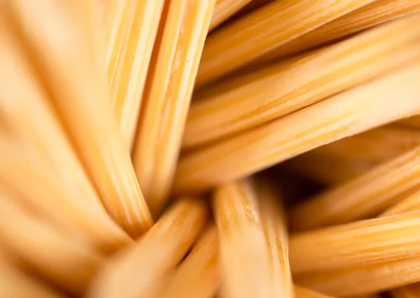 Toothpicks on a blue background. macro — Stock Photo, Image