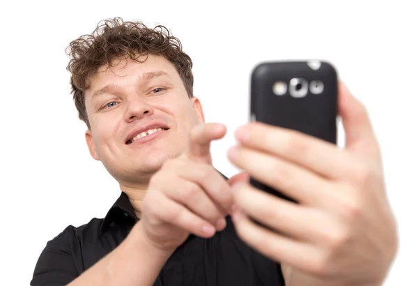 Homem com telefone em um fundo branco — Fotografia de Stock