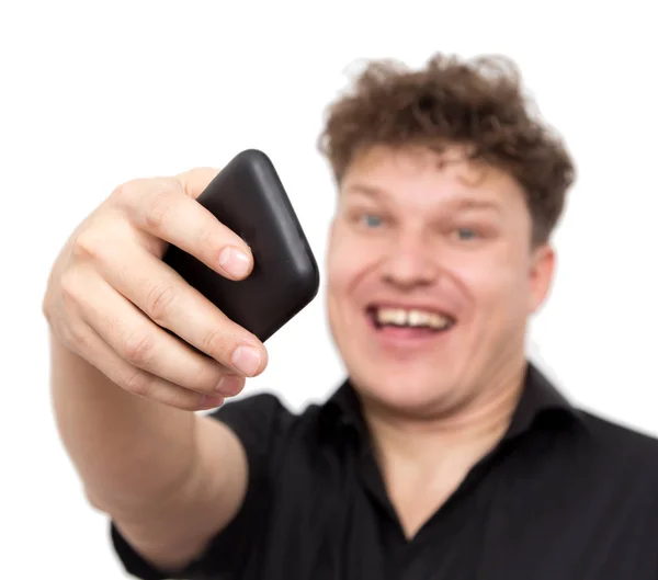 Man with phone on a white background — Stock Photo, Image