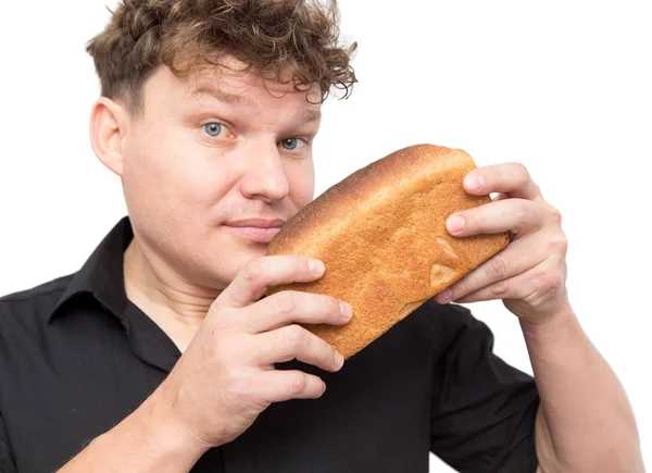 Hombre con pan sobre un fondo blanco —  Fotos de Stock