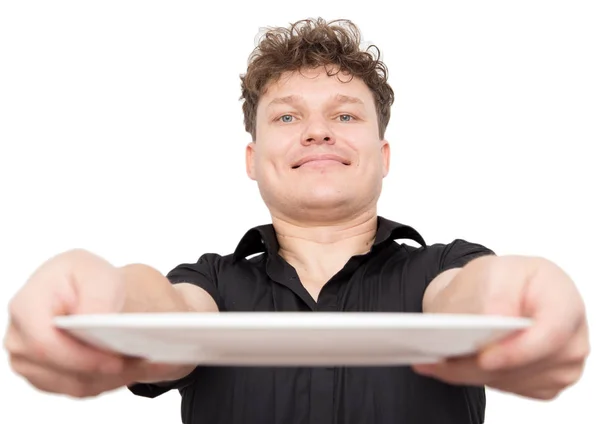 Cocinero sosteniendo un plato vacío sobre fondo blanco —  Fotos de Stock