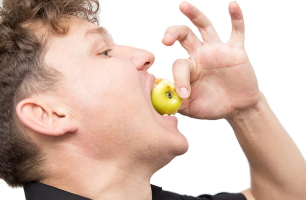 白い背景にリンゴを食べる男 — ストック写真