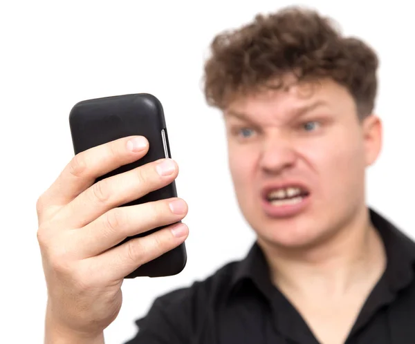 Muž s telefonem na bílém pozadí — Stock fotografie