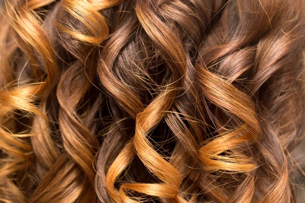Vlnité vlasy jako pozadí. textura — Stock fotografie