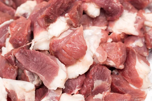 Carne cortada em fatias como fundo — Fotografia de Stock