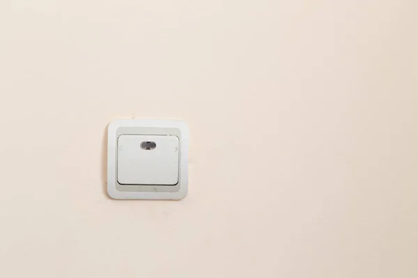 Switch on the wall as background — Stock Photo, Image