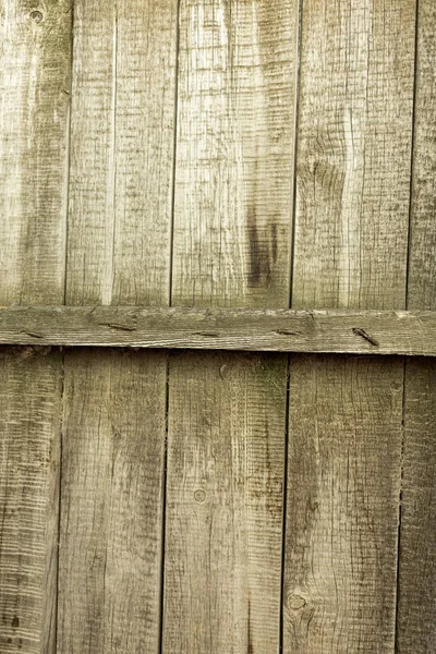 Old wooden fence as a backdrop — Stock Photo, Image