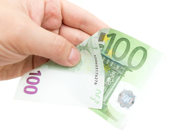 Euro v ruce na bílém pozadí — Stock fotografie
