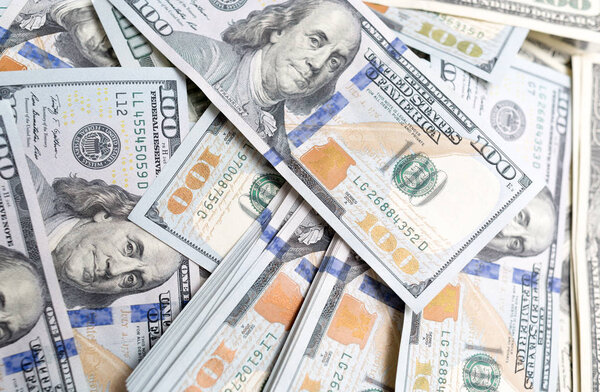 heap of dollars as background