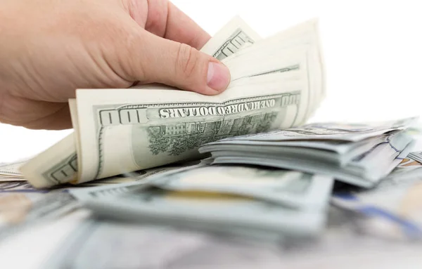 Dollar in der Hand auf weißem Hintergrund — Stockfoto