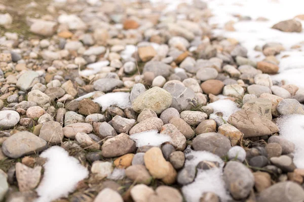 Stones in the snow on the nature — Stock Photo, Image