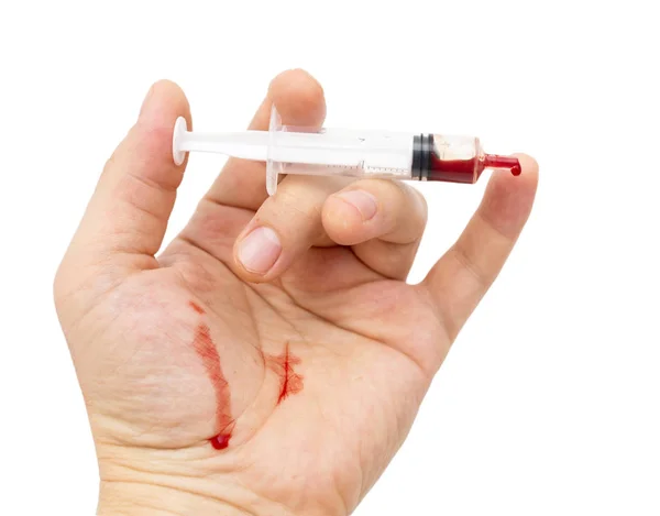 Syringe in hand on white background — Stock Photo, Image