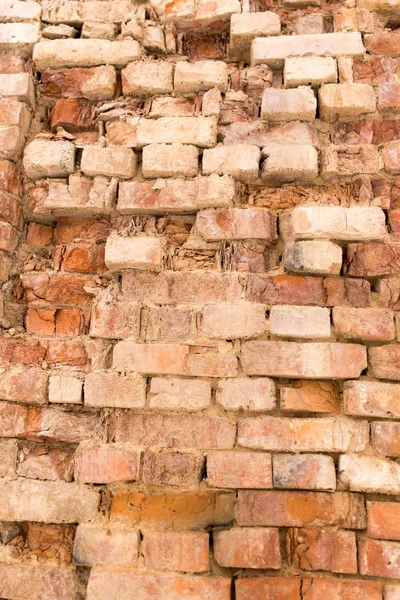 Старая кирпичная стена в качестве фона — стоковое фото