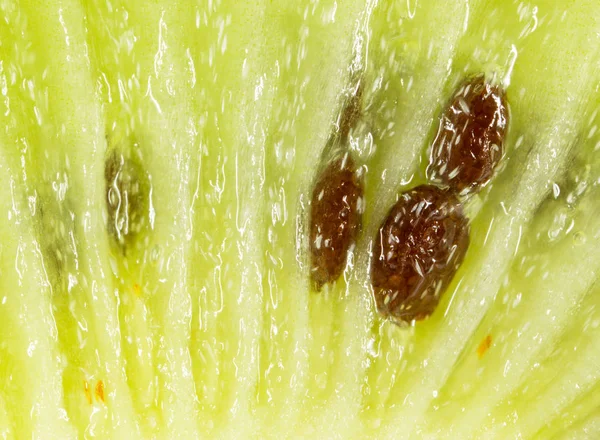 Kiwi succosa come sfondo. macro — Foto Stock