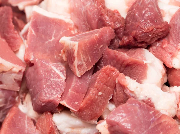 Carne cortada en rodajas como fondo —  Fotos de Stock