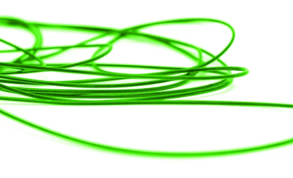 Green cable on a white background — Stock Photo, Image