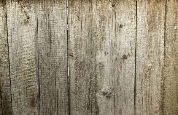 Old wooden fence as a backdrop — Stock Photo, Image