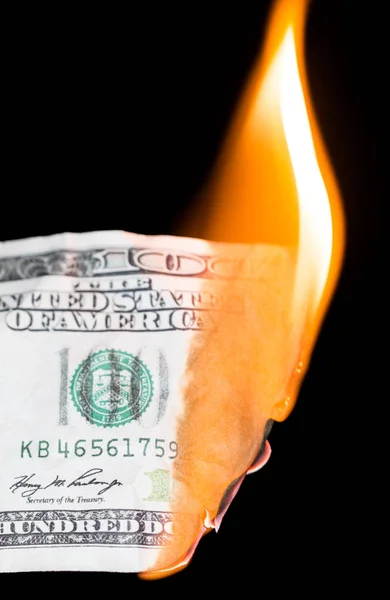 100 dollars burning on a black background — Stock Photo, Image