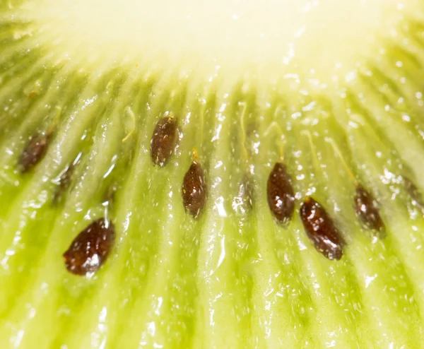 Kiwi w tle. super makro — Zdjęcie stockowe