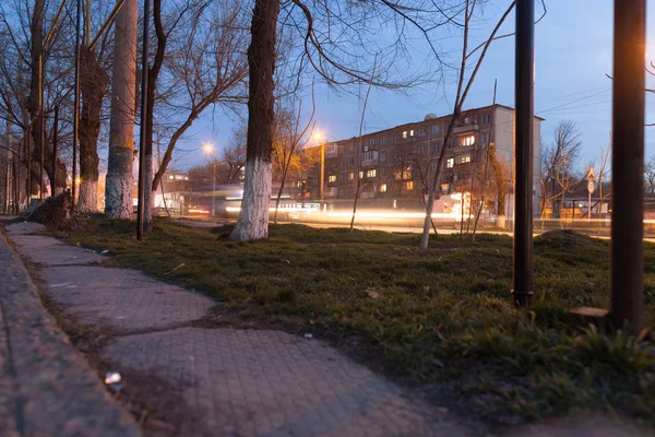 Road at night with moving cars — Stock Photo, Image