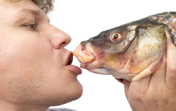 Kiss a fish on a white background — Stock Photo, Image