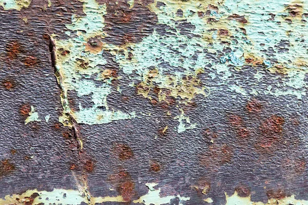 Old rusty metal with paint as background — Stock Photo, Image