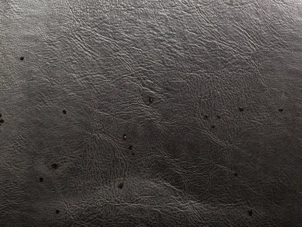 Water on black leather — Stock Photo, Image