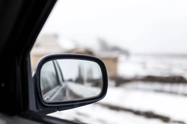 Mirror in the car in motion — Stock Photo, Image